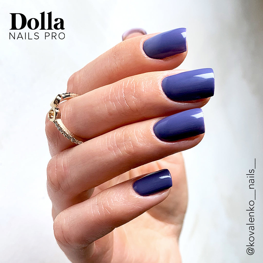 Nails painted with Serenity lavender-blue gel polish