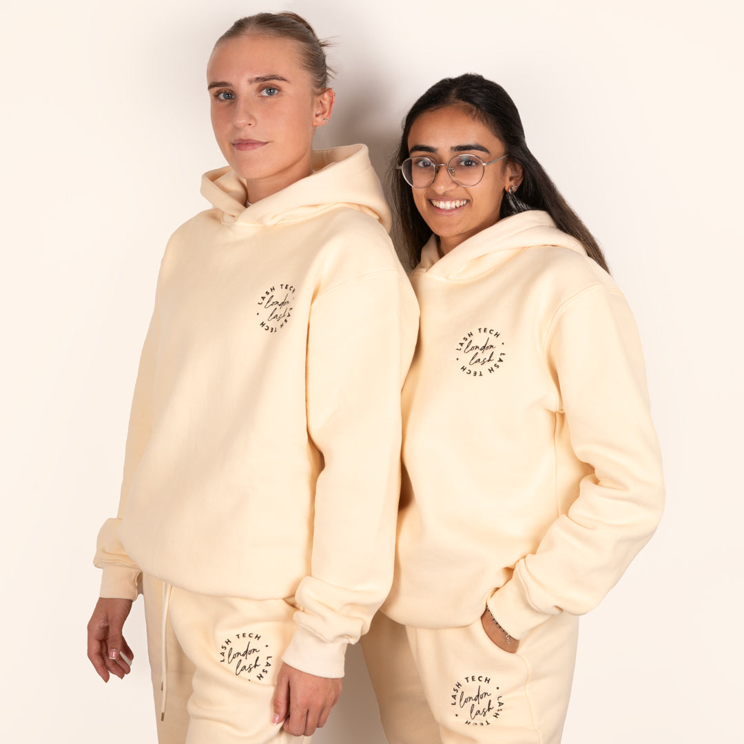 Lash technicians wearing London Lash beige hoodie