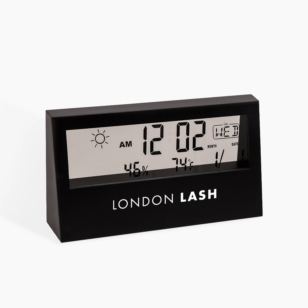 Digital hygrometer on a white background, branded 'London Lash'.