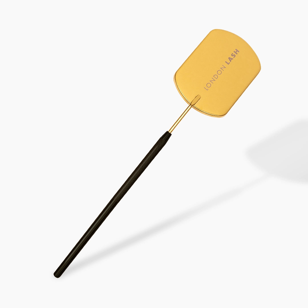 Three lash mirrors on a white background