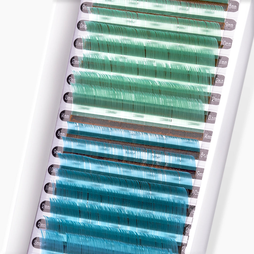 Close up image of London Lash mint green and ocean blue faux mink coloured lash extension tray on white background