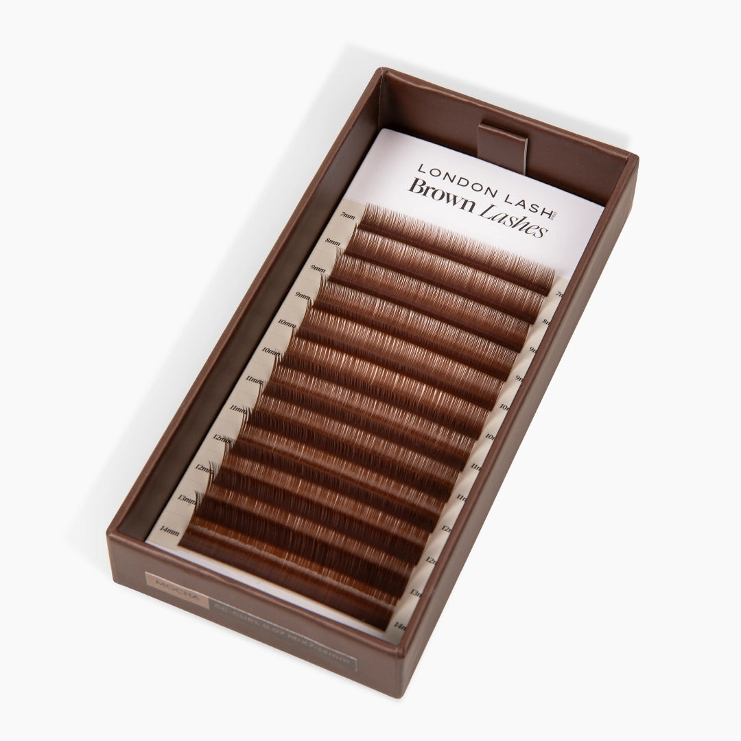 open lash tray with warm brown coffee shade eyelashes inside