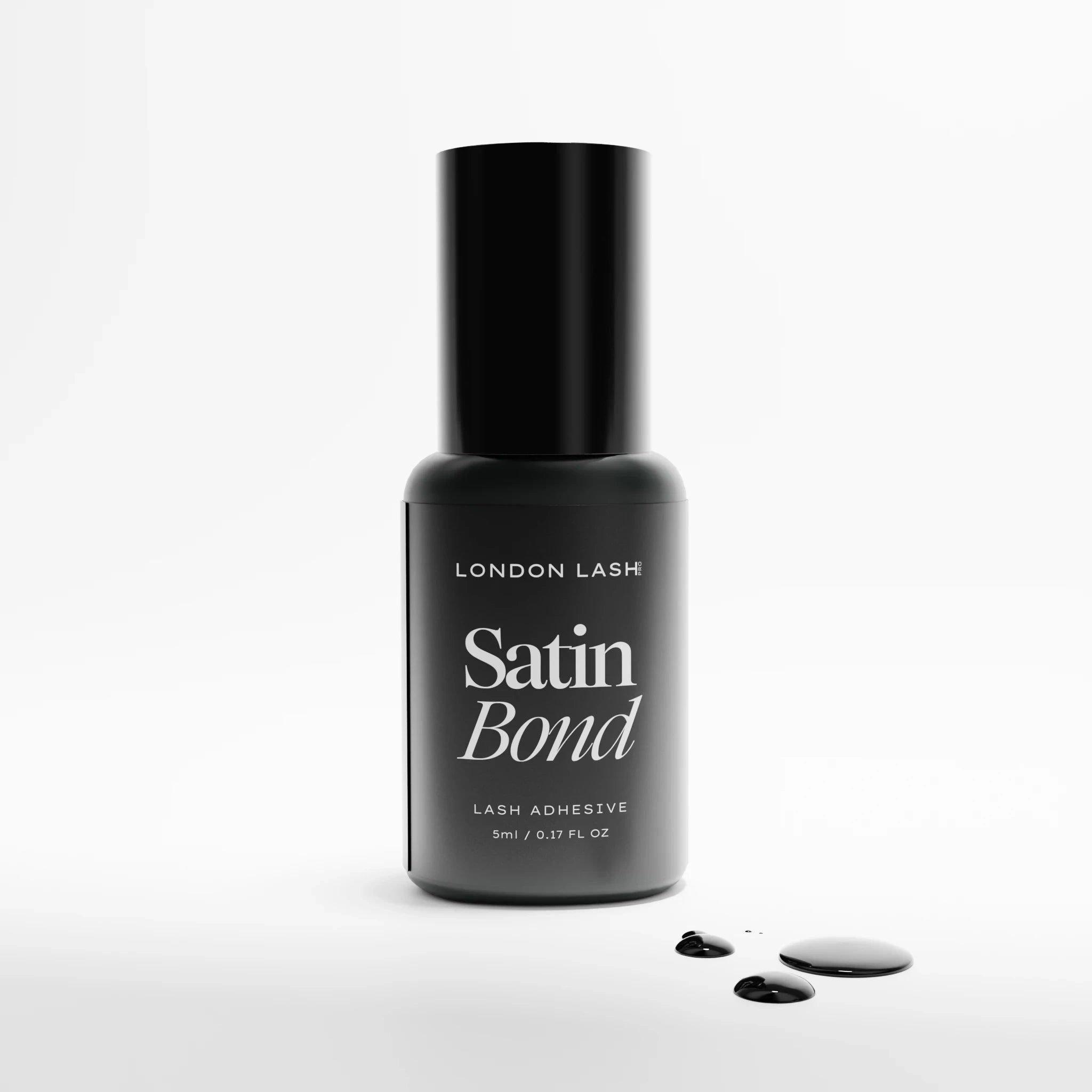 Bottle of London Lash Satin Bond lash adhesive on a white background