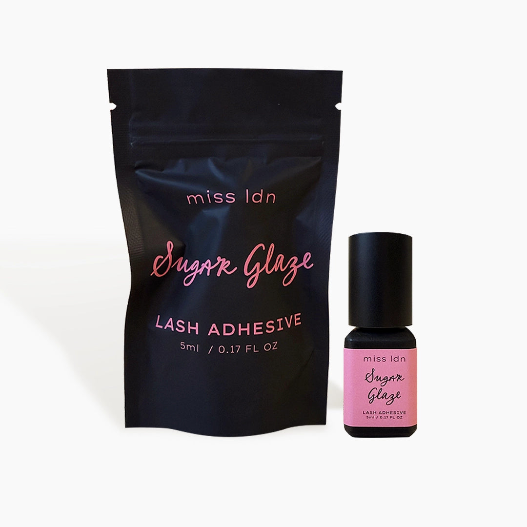 Miss Idn Sugar Glaze lash adhesive packaging on a white background