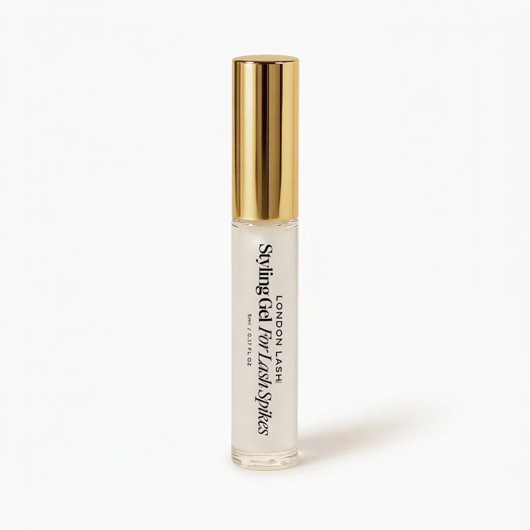 Styling gel for lash spikes bottle with gold cap on a white background
